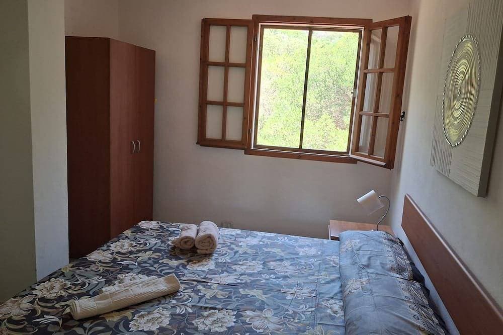 Foto 3 von 20: Apartment in Del Mirto Holiday House with terrace overlooking the sea of Nora