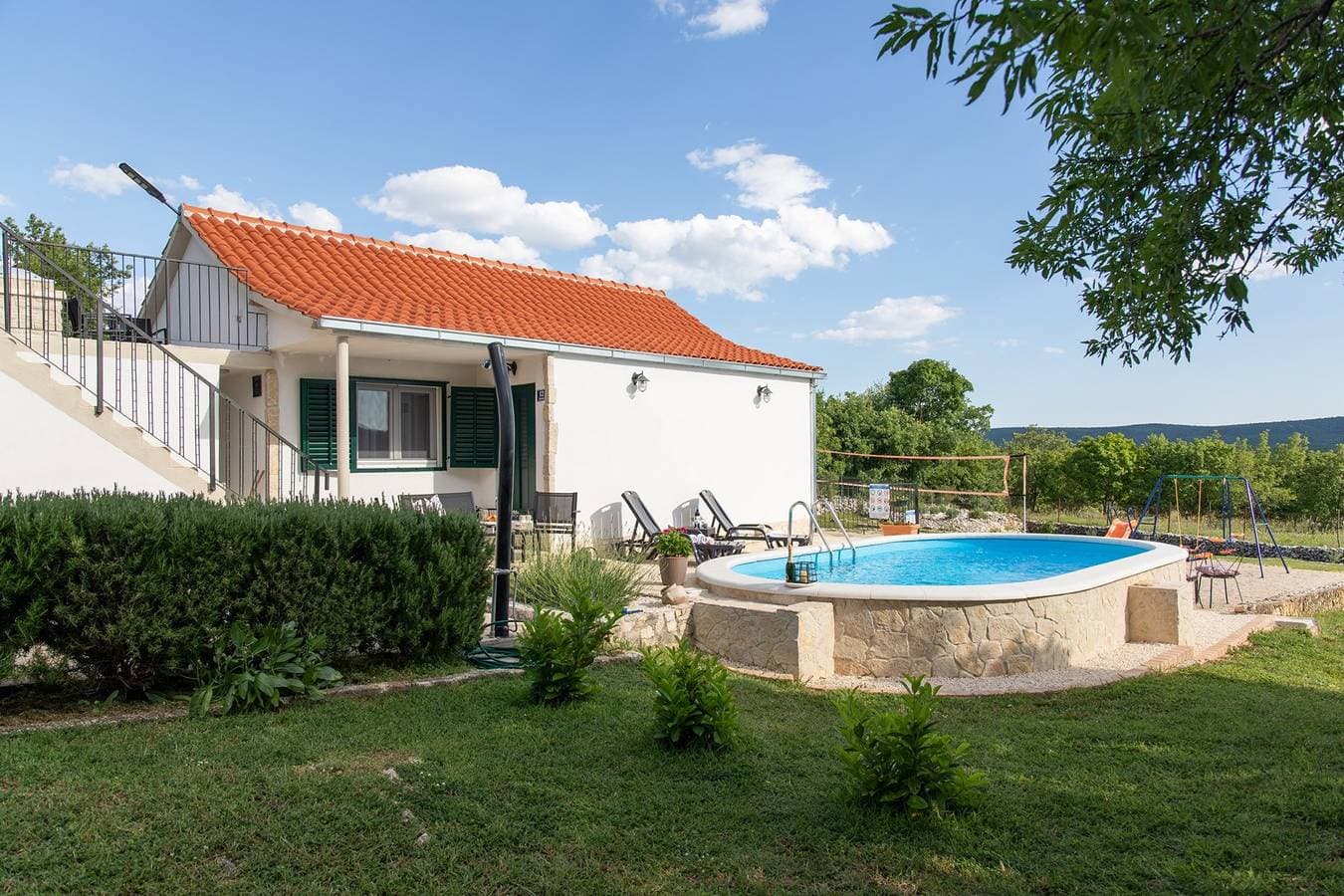 Foto 6 von 29: Ferienhaus mit zwei Schlafzimmern und Pool