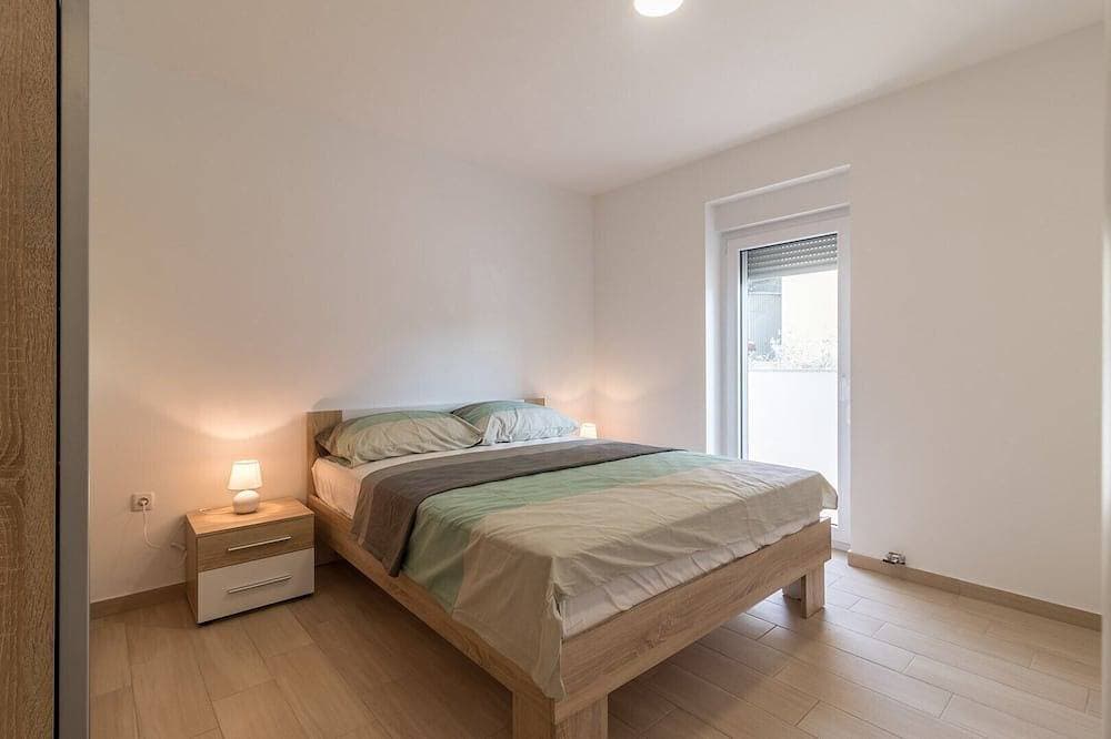 Foto 5 von 23: Comfortable holiday house with apartments / Amazing spacious apartment with patio and grill / A1
