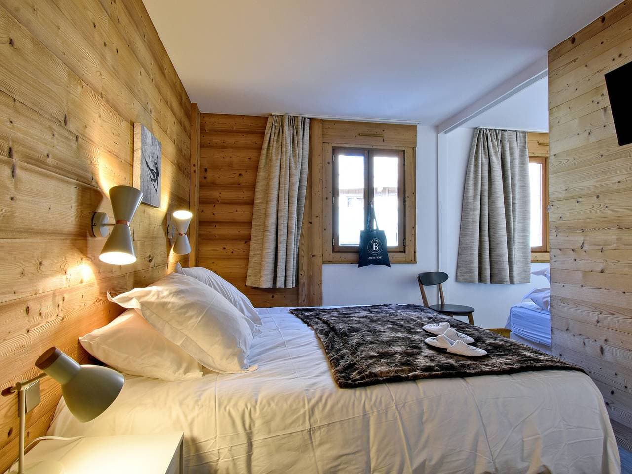Foto 7 von 10: Gemütliches Herzstück Courchevel 1850: 2 Schlafzimmer, Ski-Kabinen, Willkommensgeschenk