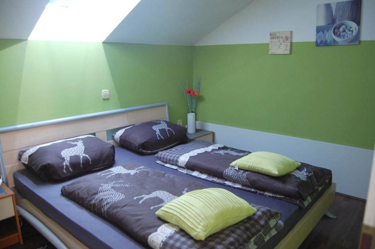 Foto 2 von 12: Quadruple Room