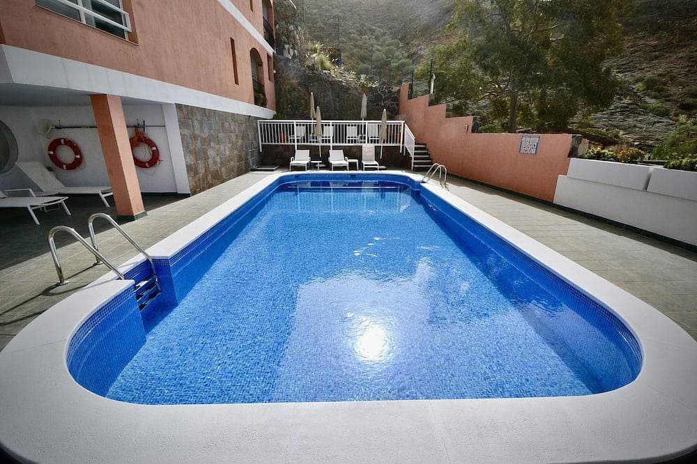 Foto 13 von 17: Apartment with communal swimming pool in Playa de Mogan - Paraiso