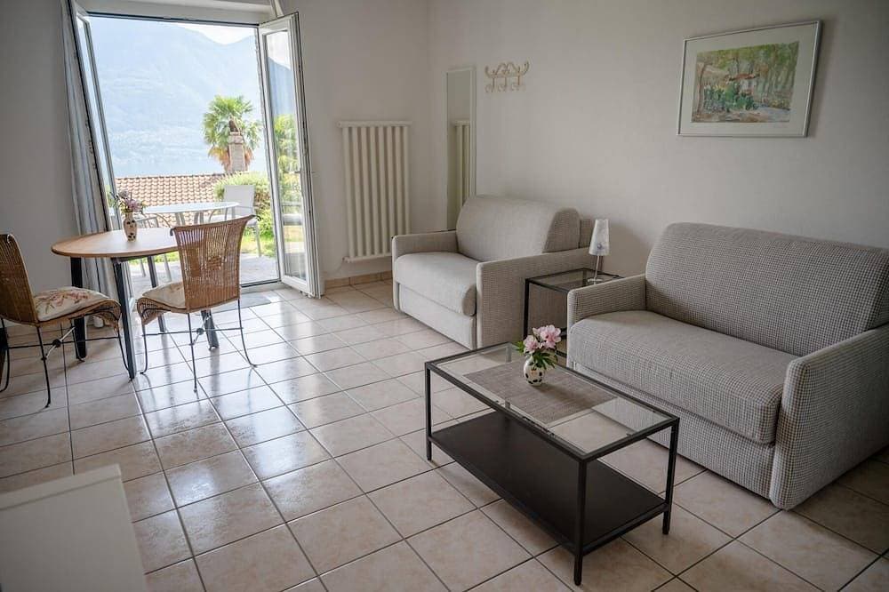 Foto 5 von 30: Erleben Sie Palmen, Pool und Panorama: Casa Belsito, Orselina, am Lago Maggiore