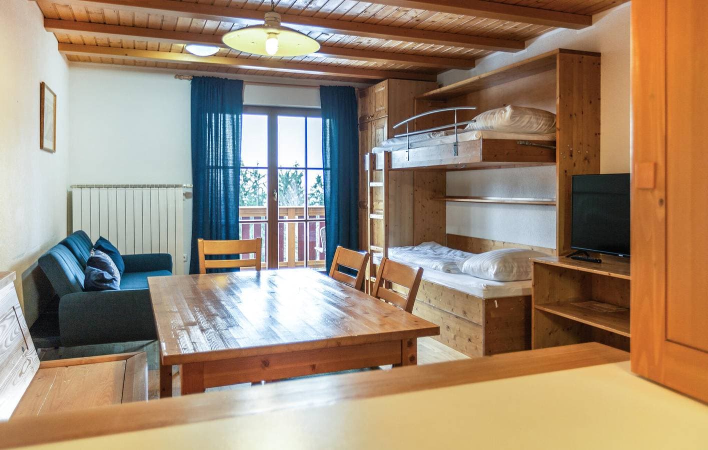 Foto 8 von 34: Ferienwohnung für 11 Personen mit Terrasse