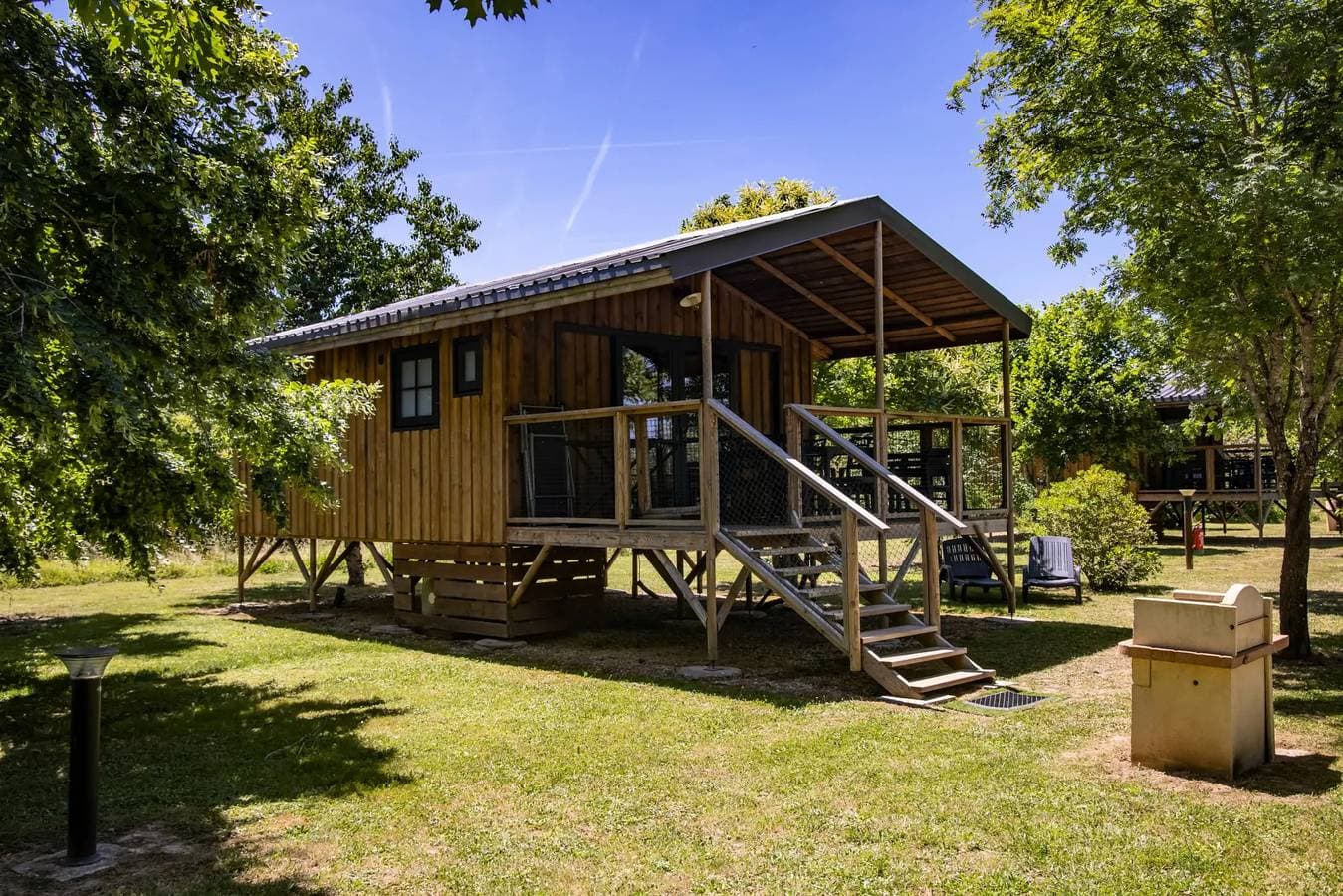 Foto 2 von 44: Chalet Pmr Komfort 1 Zimmer klimatisierter - 35m2+überdachte Terrasse von 14m2 - Haushalt Inklusive* 4 Personen