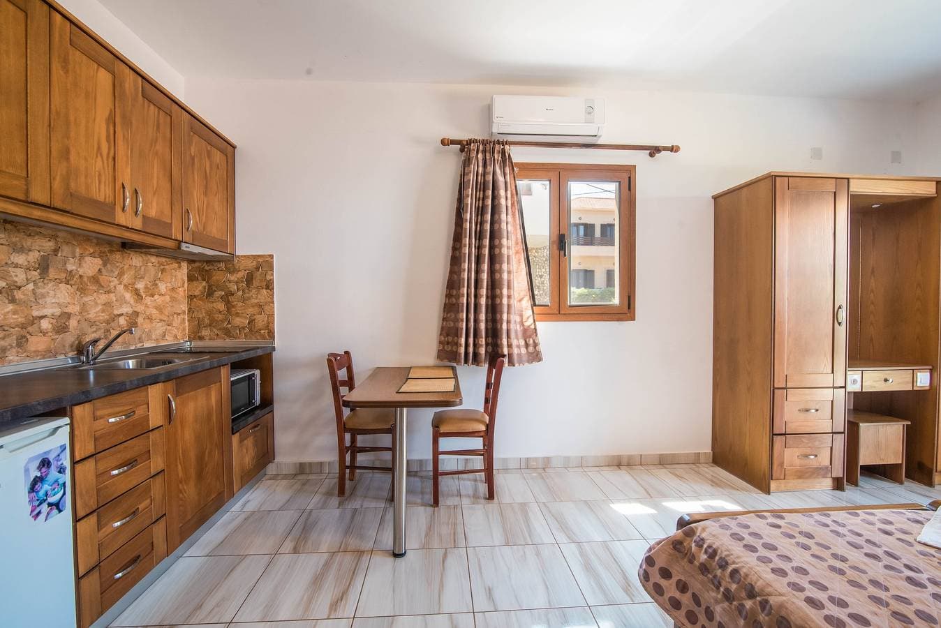 Foto 5 von 23: Mirage Arillas Studio Typ B14' mit Meerblick, Gemeinschaftspool und WLAN
