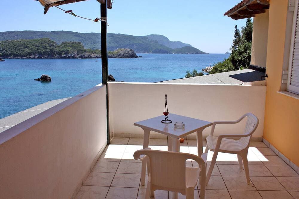 Foto 13 von 18: Room with amazing sea view 20 meters from the beach