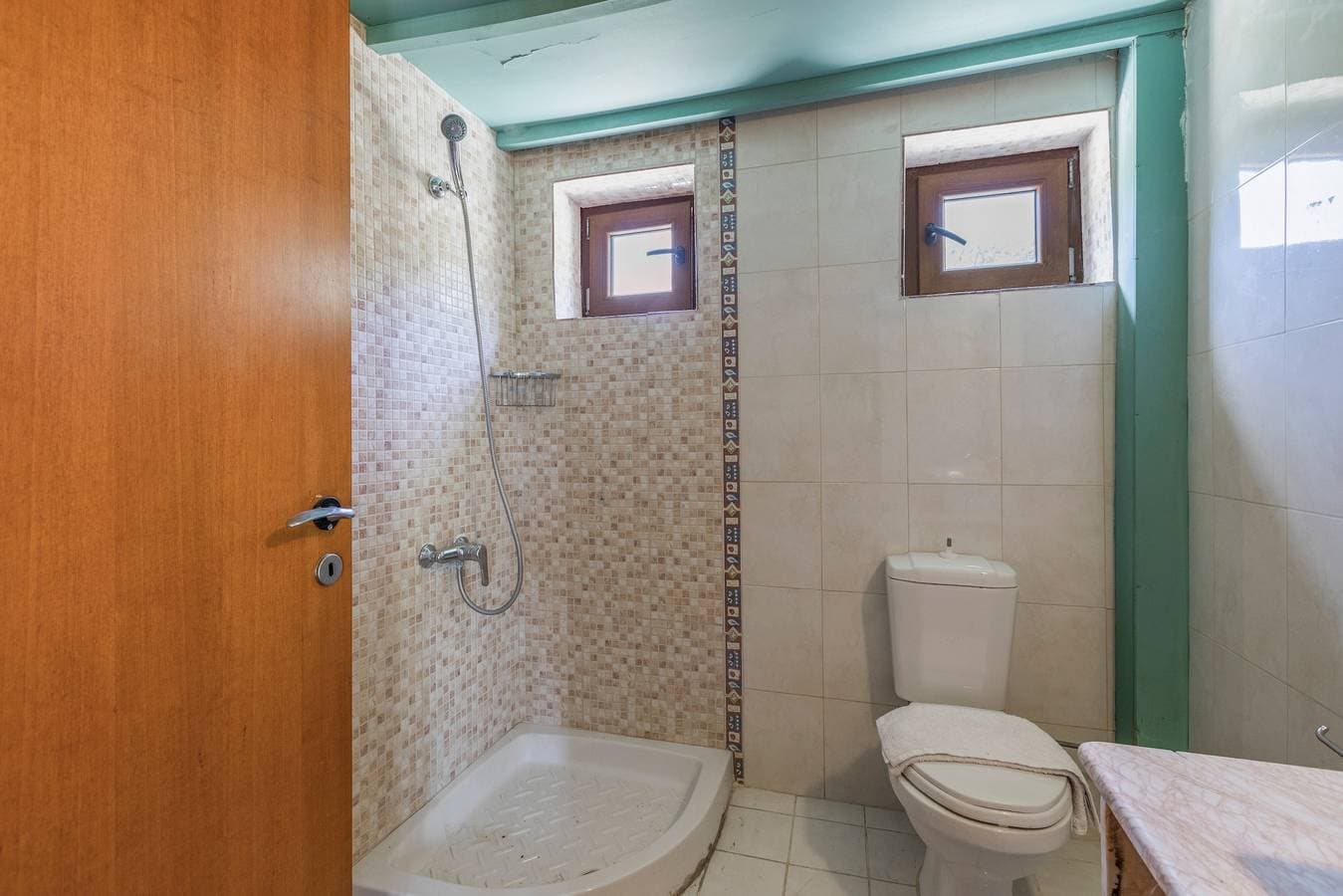 Foto 10 von 31: Finca 'Akros Oreon Ferienwohnung Voliares' mit Bergblick, privater Terrasse und WLAN