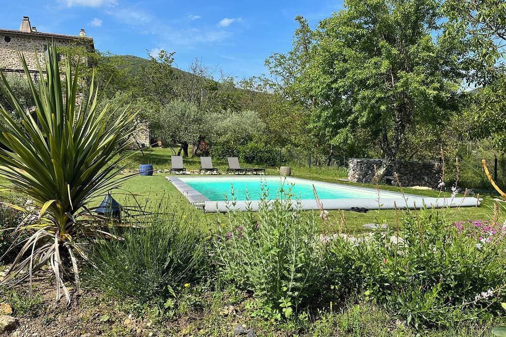 Foto 13 von 14: Gites du Bouscas La Murette 3 star rating Atypical stone arched studio apartment