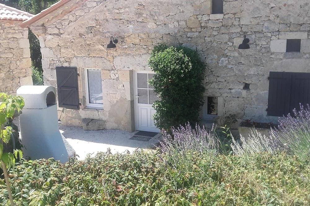 Foto 8 von 23: Ferienhaus auf dem Land mit privater Terrasse, Garten und WLAN