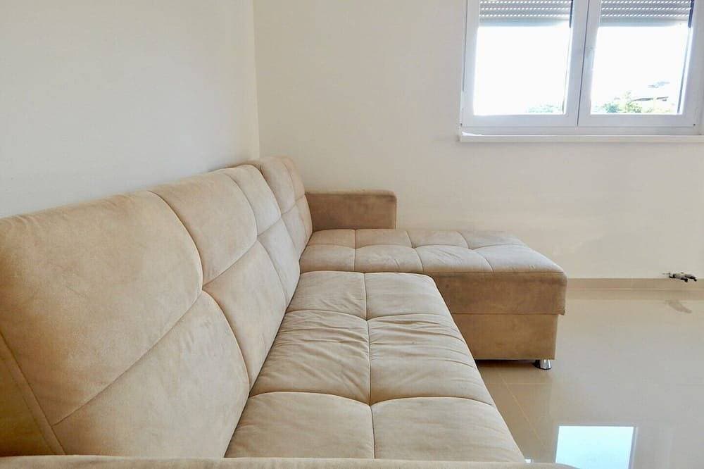Foto 9 von 25: Comfortable holiday house with apartments / Beautiful first floor apartment with terrace and grill / A3