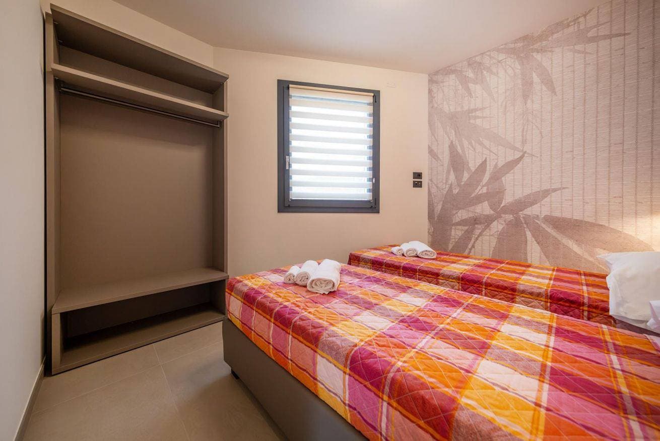 Foto 10 von 12: ApartmentsGarda - I Fiori D'Ulivo B - Oleandro