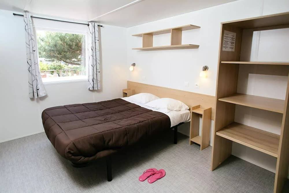 Foto 2 von 15: Campsite Seasonova Saint Michel *** - Cottage Evasion - 2 Bedrooms 4 persons