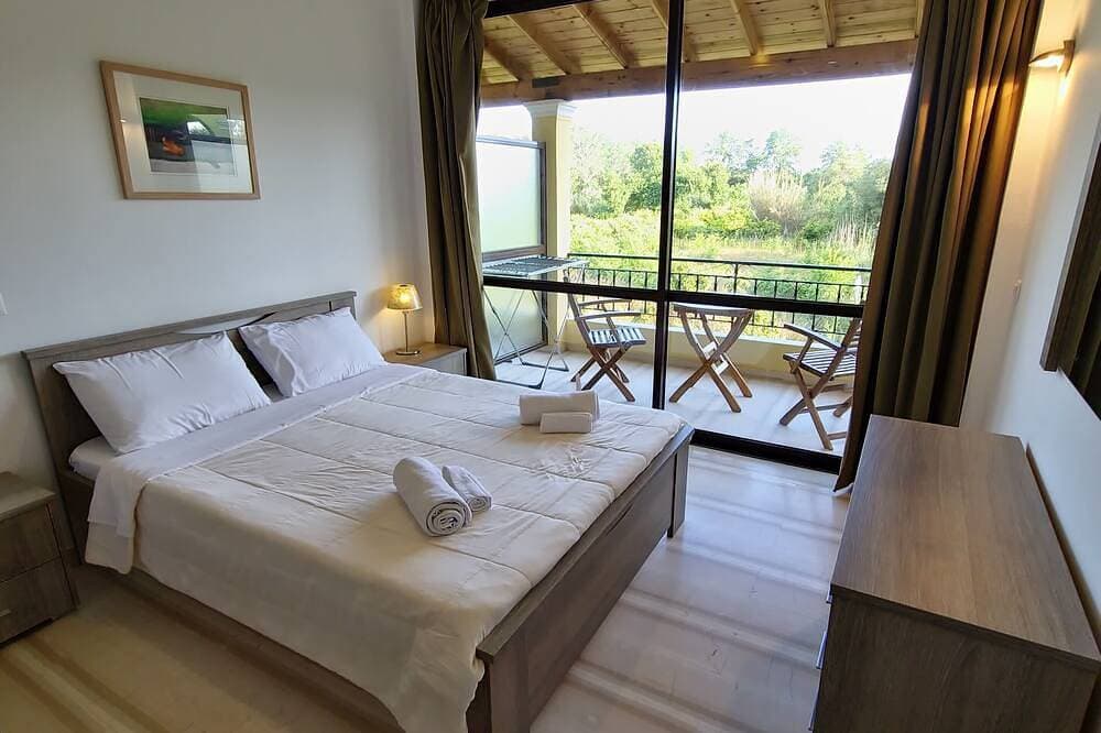 Foto 3 von 30: Cozy studio in a green peaceful area near the beach in delightful Lefkimmi Corfu