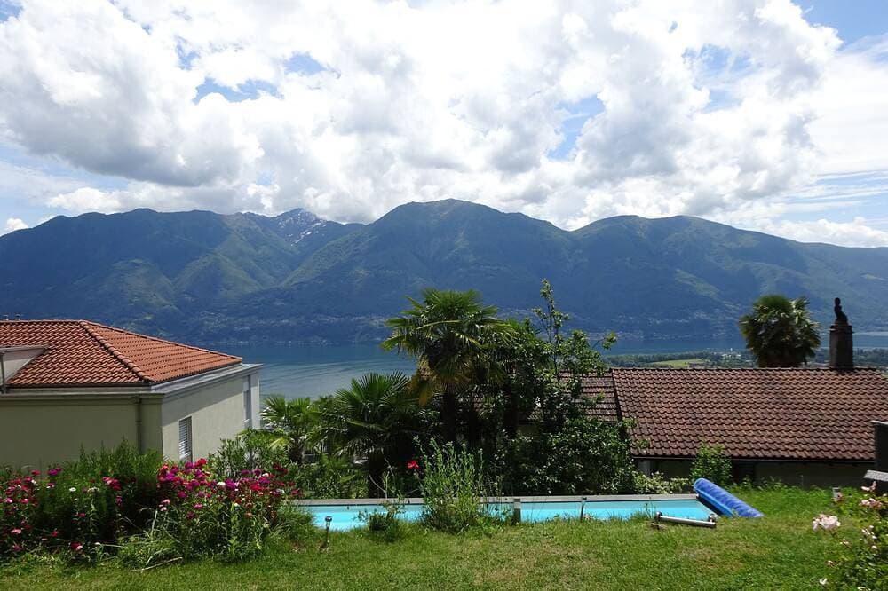 Foto 13 von 30: Erleben Sie Palmen, Pool und Panorama: Casa Belsito, Orselina, am Lago Maggiore