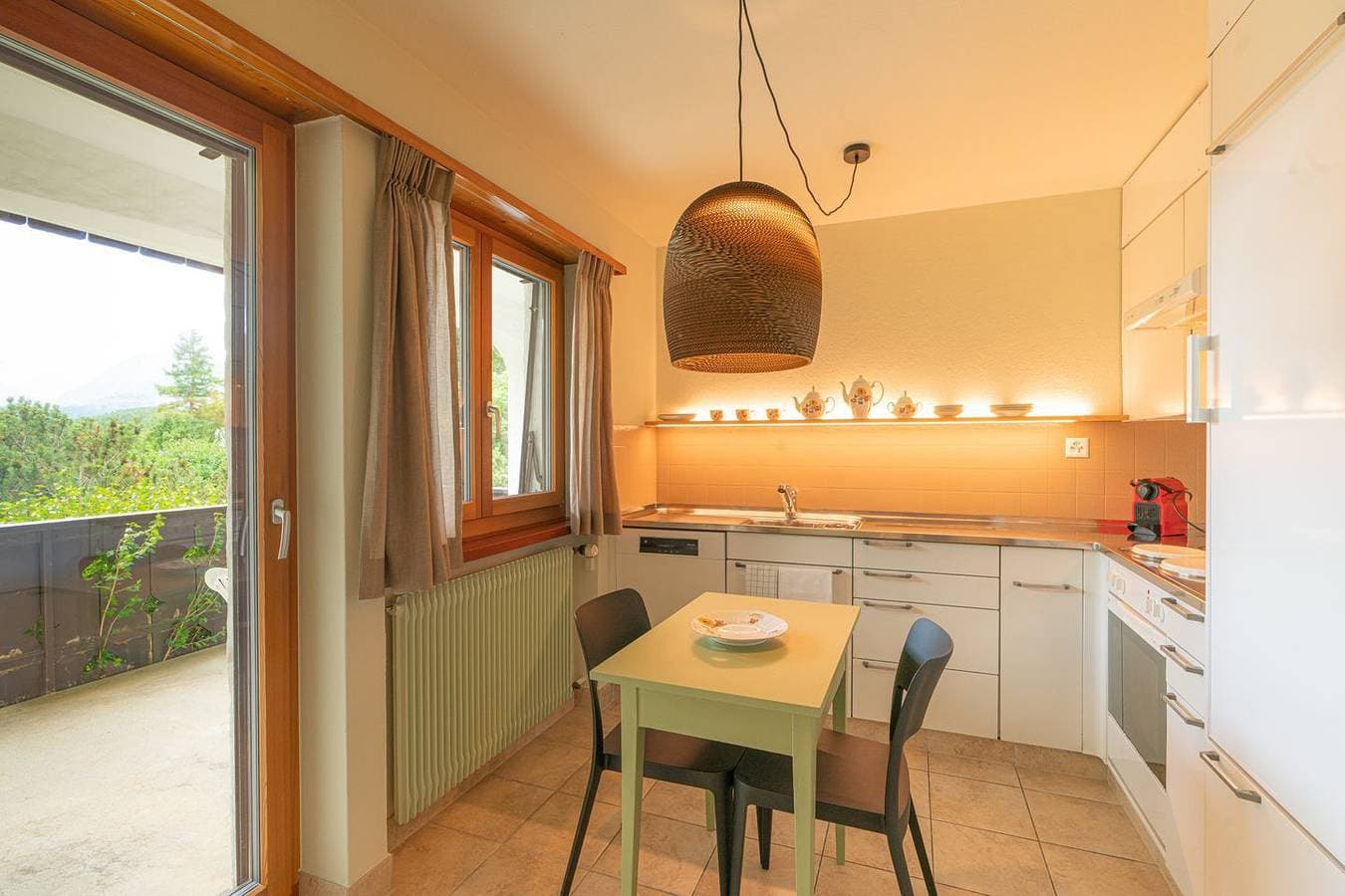Foto 8 von 25: Chesa Tscheppa 1 – Wohnung mit Seeblick & Gartensitzplatz
