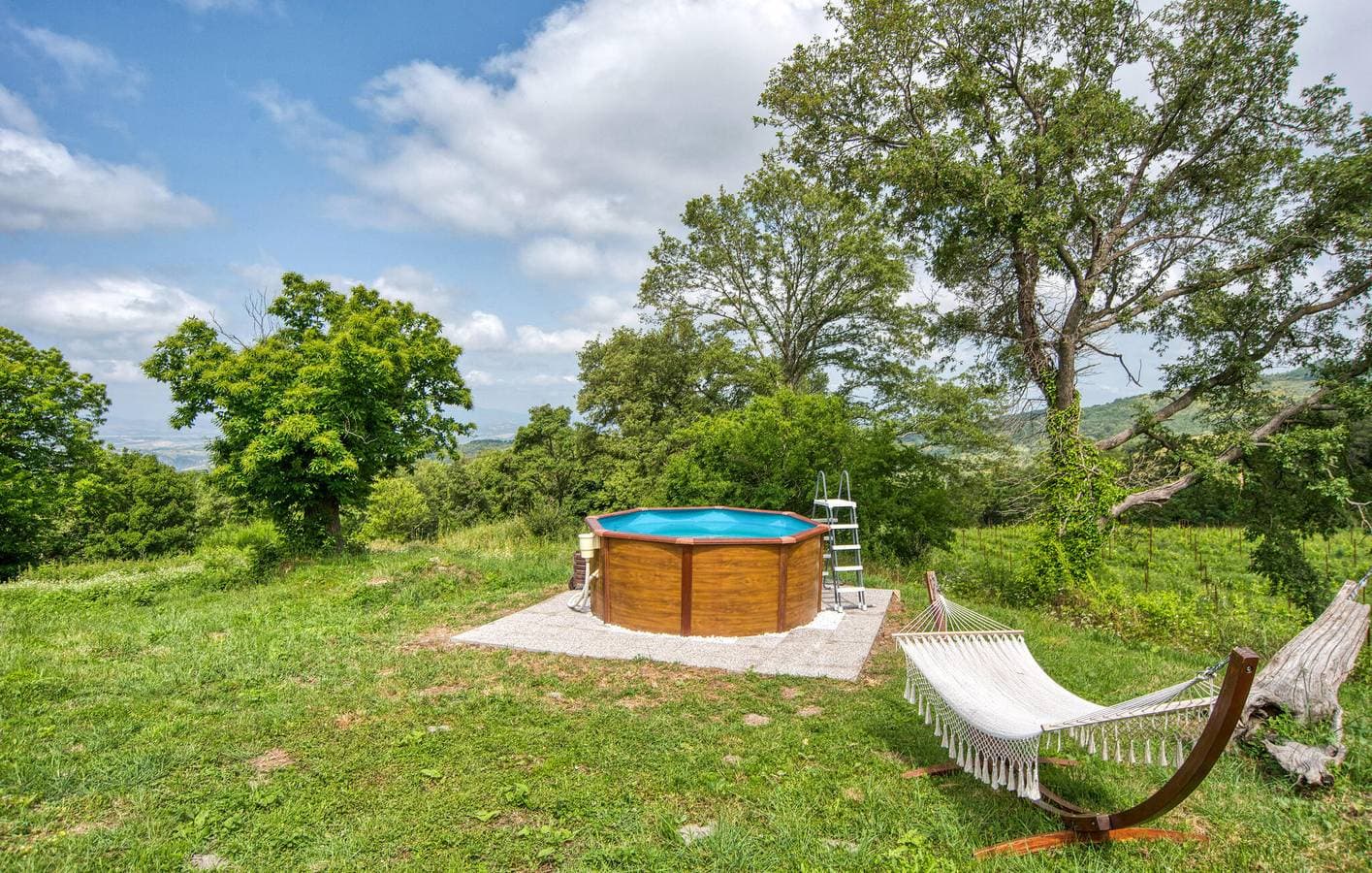 Foto 12 von 30: Charmante 100 m² große Ferienwohnung mit Pool, Garten und WLAN in der Nähe von Arcidosso