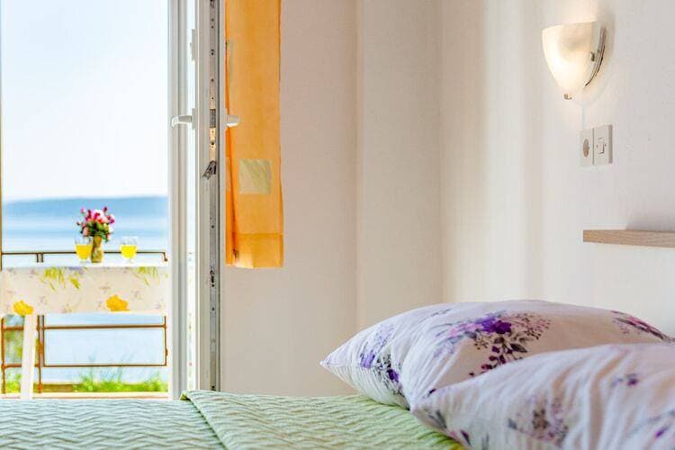 Foto 5 von 18: Rooms Sani - Double Room with Terrace and Sea View (S3)