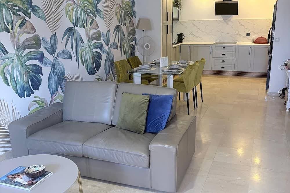 Modern ground floor apartment with large private patio/terrace and shared pool 1