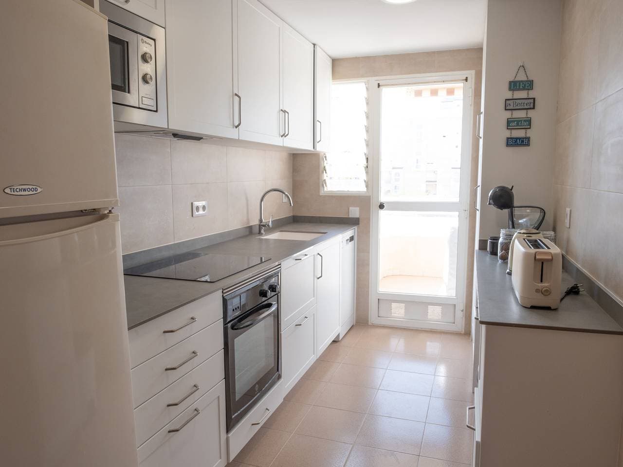 Foto 5 von 24: Helle Wohnung mit Pool und Parkplatz in Xeraco Playa