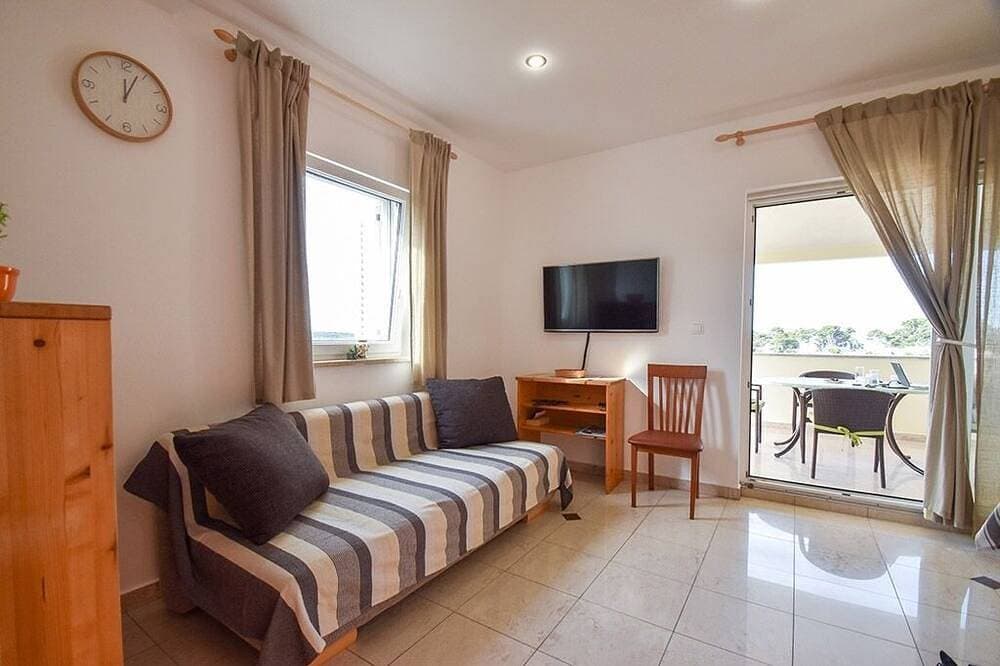 Foto 7 von 13: 2-Zimmer-Ferienwohnung mit Terrasse und Meerblick Banjol, Rab