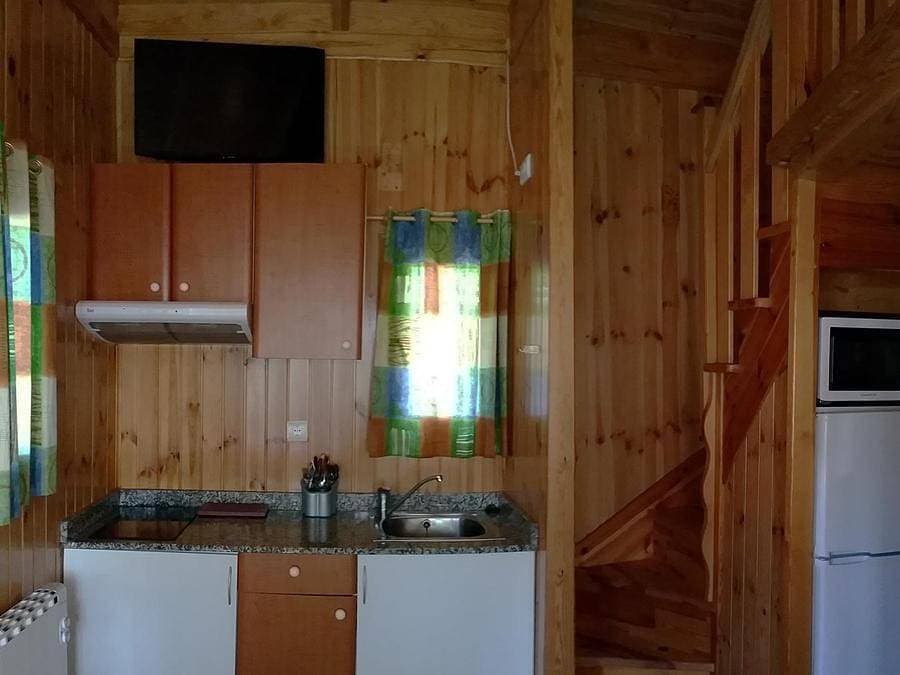 Foto 5 von 50: Camping La Soleia d'Oix - Bungalow 6 personen
