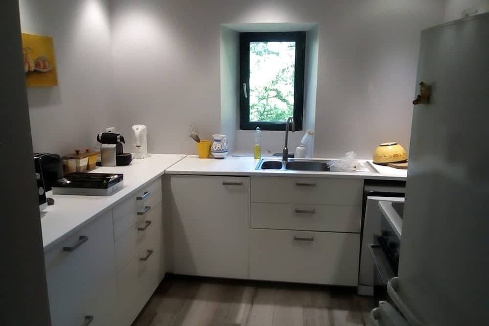 Foto 6 von 6: Haus am Ende eines großen Hauses