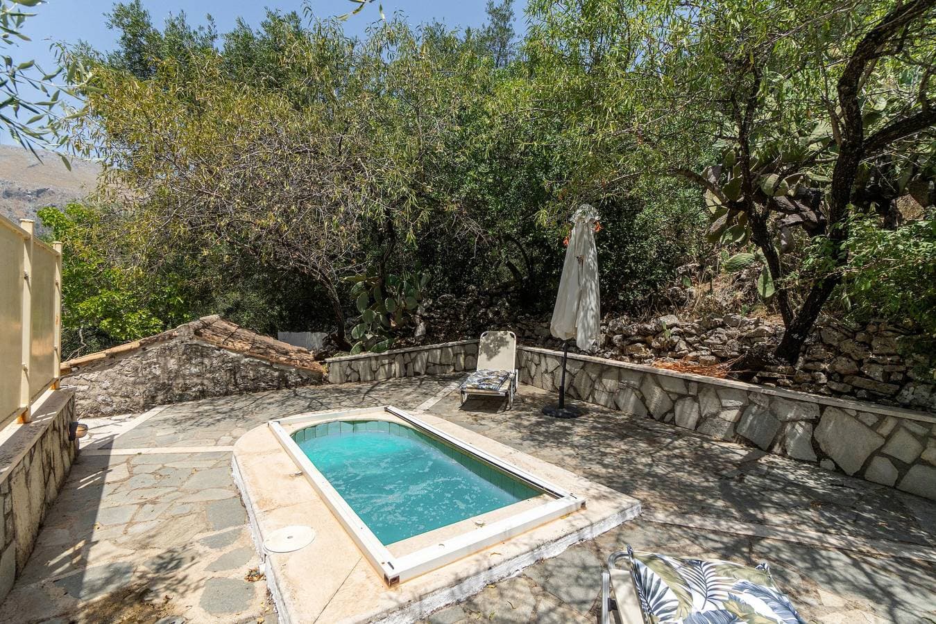 Foto 2 von 26: Ferienhaus 'Oldstone Cottage' mit Meerblick, privater Terrasse und WLAN