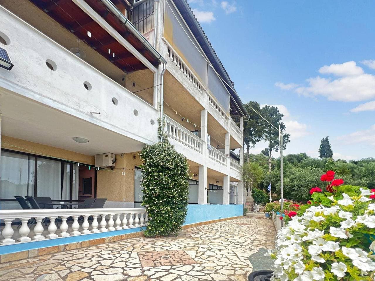 Foto 11 von 19: Apartment 'Andromaches Family Room with Balcony' mit Meerblick, WLAN und Klimaanlage