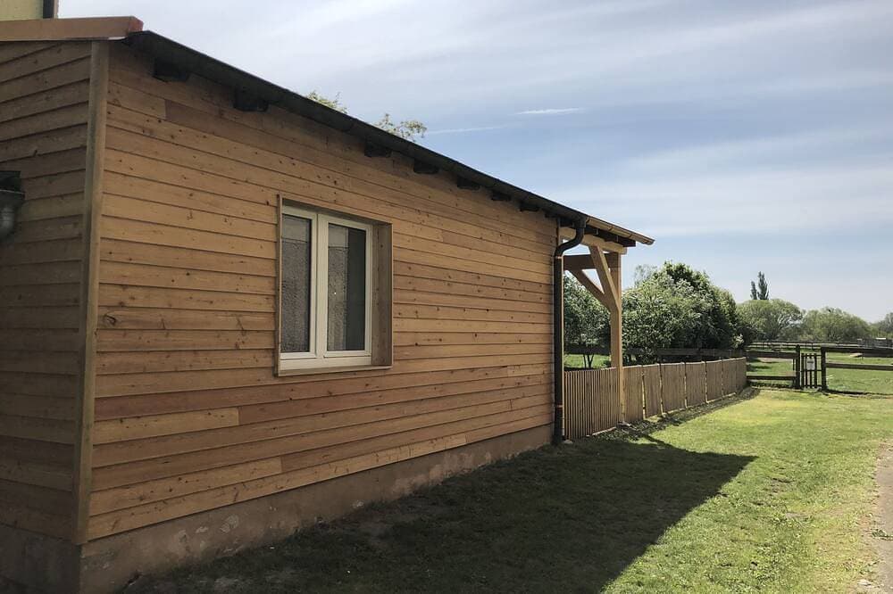 Foto 8 von 30: Idyllisches Holzhaus mit eigenem Garten direkt am See