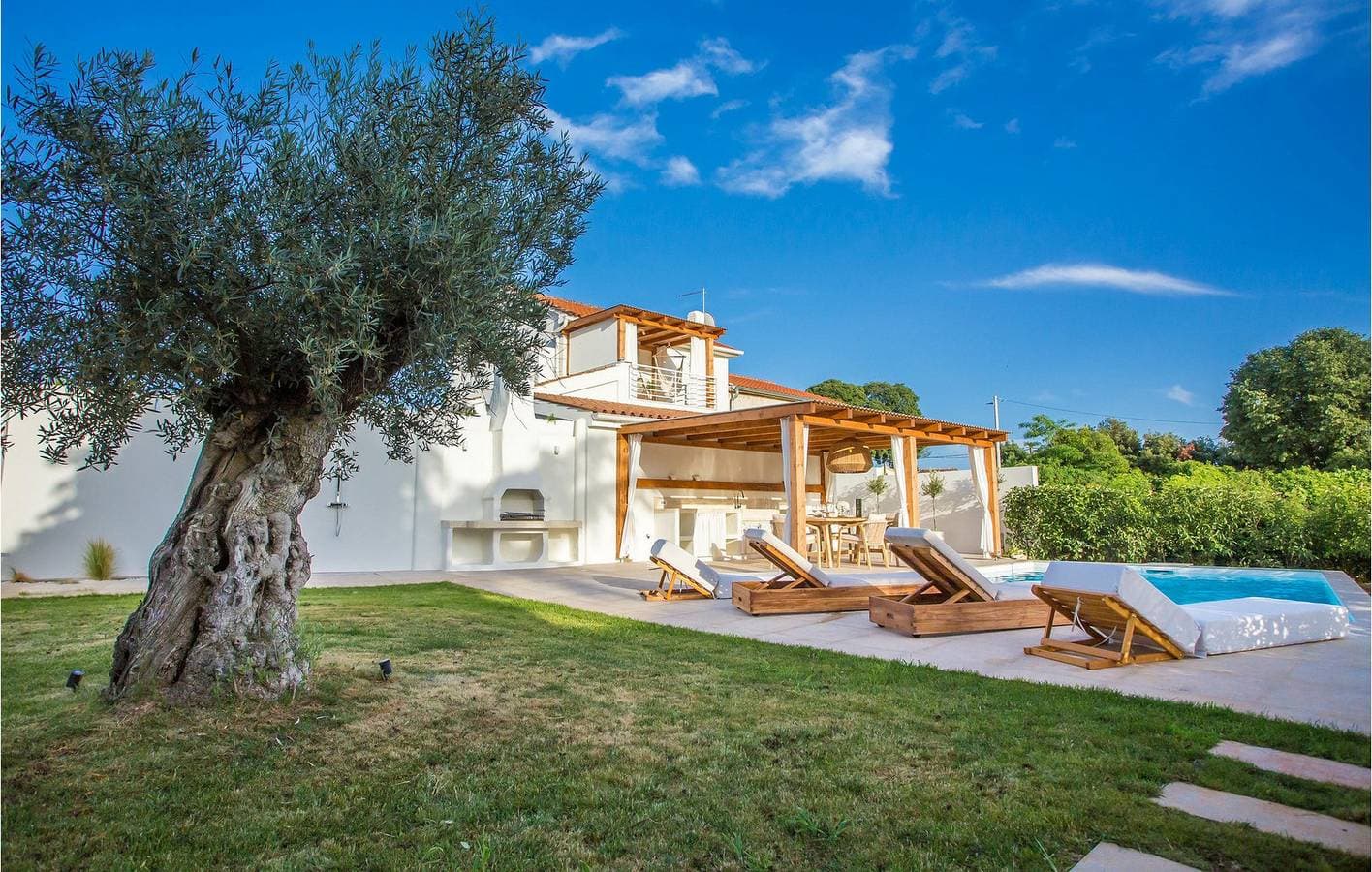 Foto 5 von 29: Gemütliche 85 m² große Wohnung mit Pool, Terrasse und Parkplatz in Kadumi
