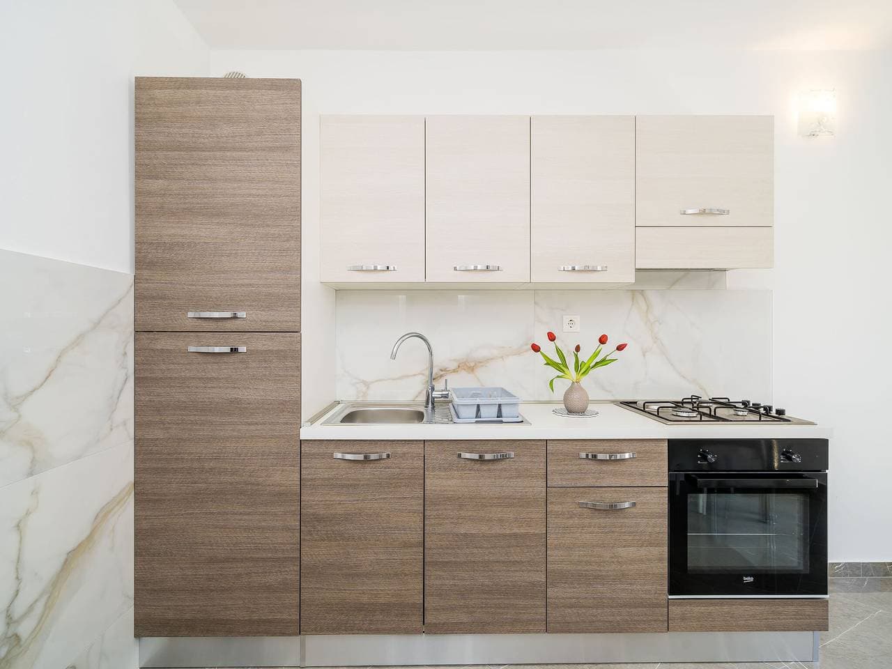 Foto 4 von 22: Apartments & Rooms Barišić-Standard One Bedroom Apartment with Balcony and Garden View(Apt-3)