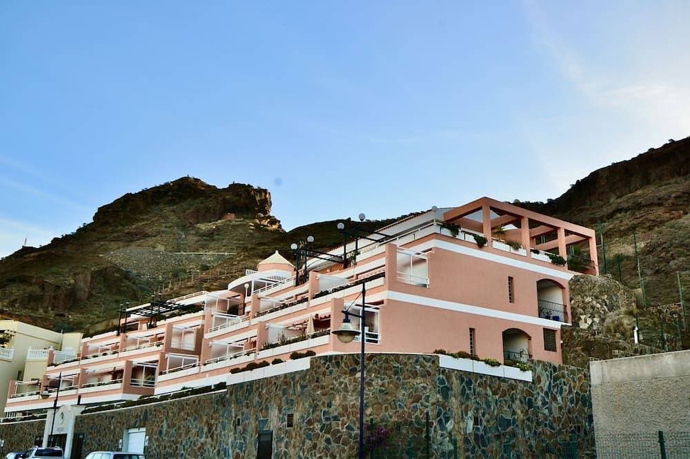 Foto 8 von 17: Apartment with communal swimming pool in Playa de Mogan - Paraiso