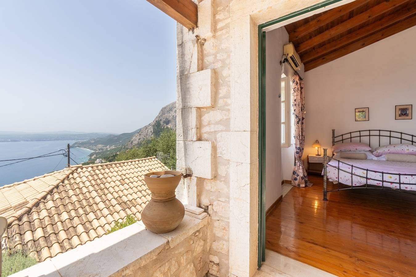 Foto 10 von 26: Ferienhaus 'Oldstone Cottage' mit Meerblick, privater Terrasse und WLAN