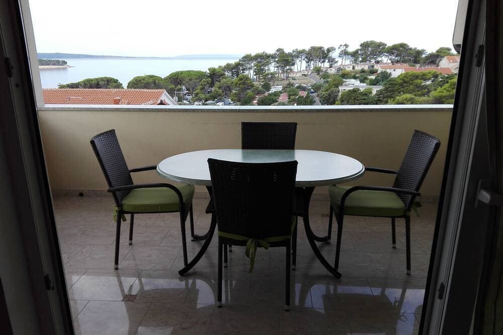 Foto 9 von 13: 2-Zimmer-Ferienwohnung mit Terrasse und Meerblick Banjol, Rab
