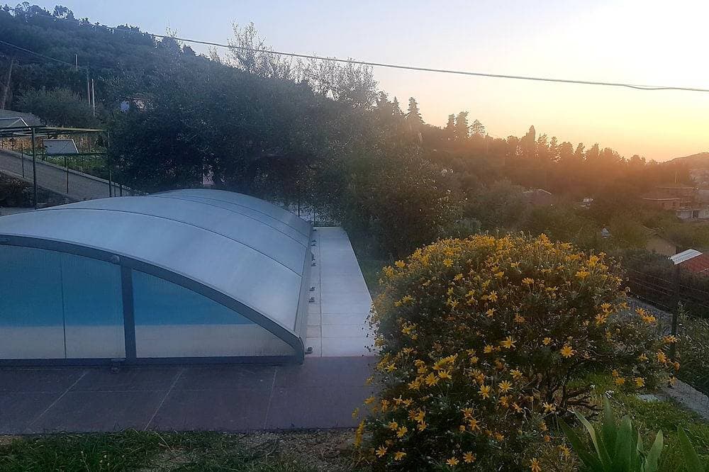 Foto 12 von 24: App.in semi-detached villa private garden and parking shared pool