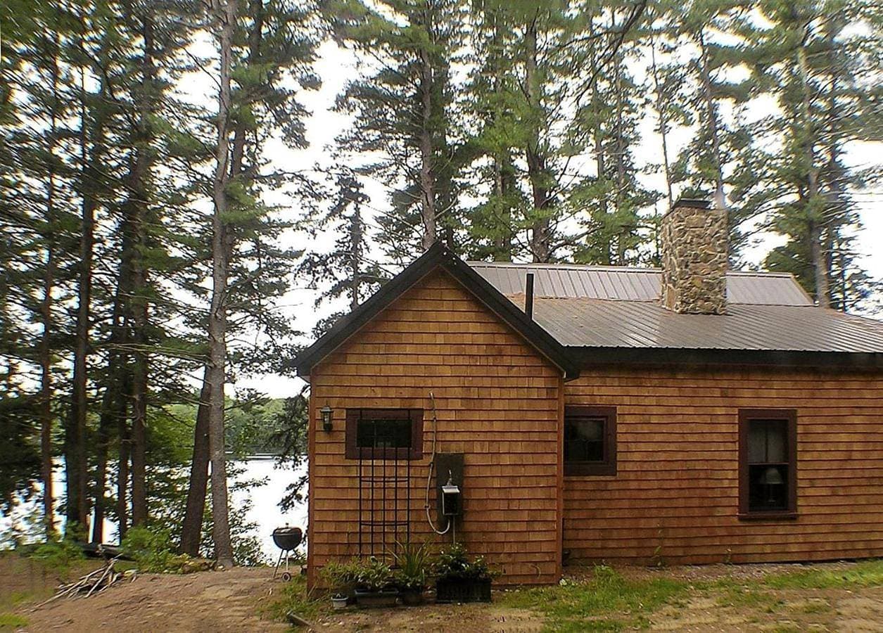 Rustic Lakefront Cabin Rental with Dock on Bauneg Beg Lake near Portland, Maine 1