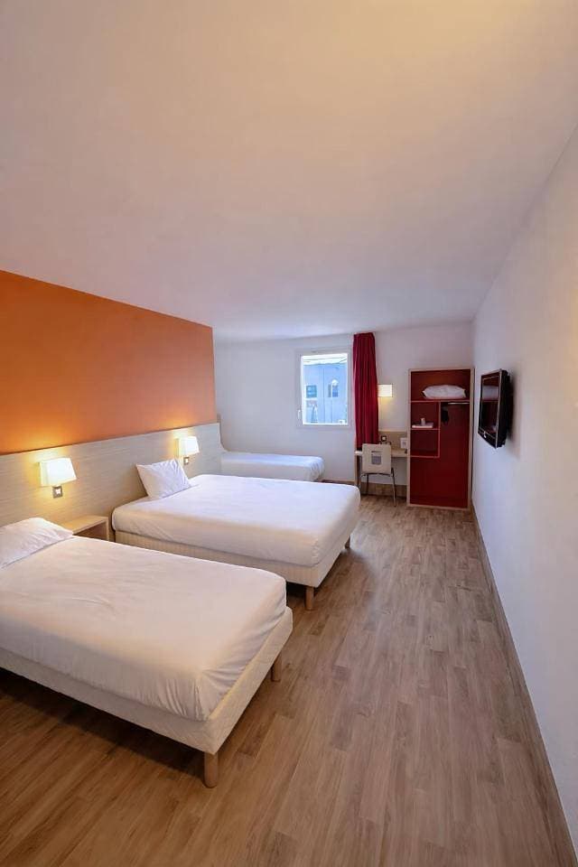 Foto 6 von 9: Quadruple Room