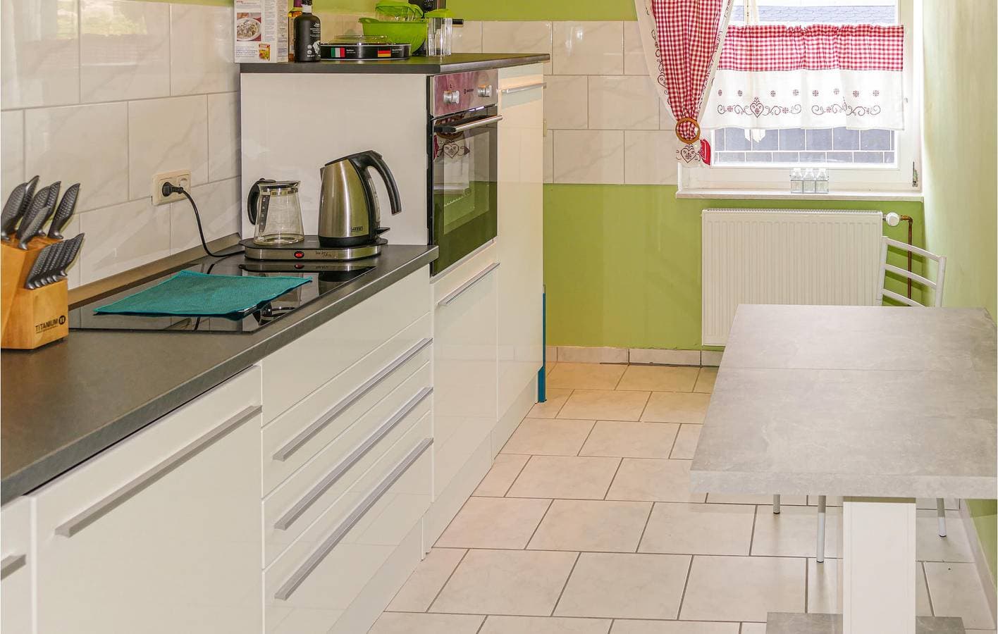 Foto 5 von 14: Sonnige Terrassenwohnung mit Parkplatz und Garten
