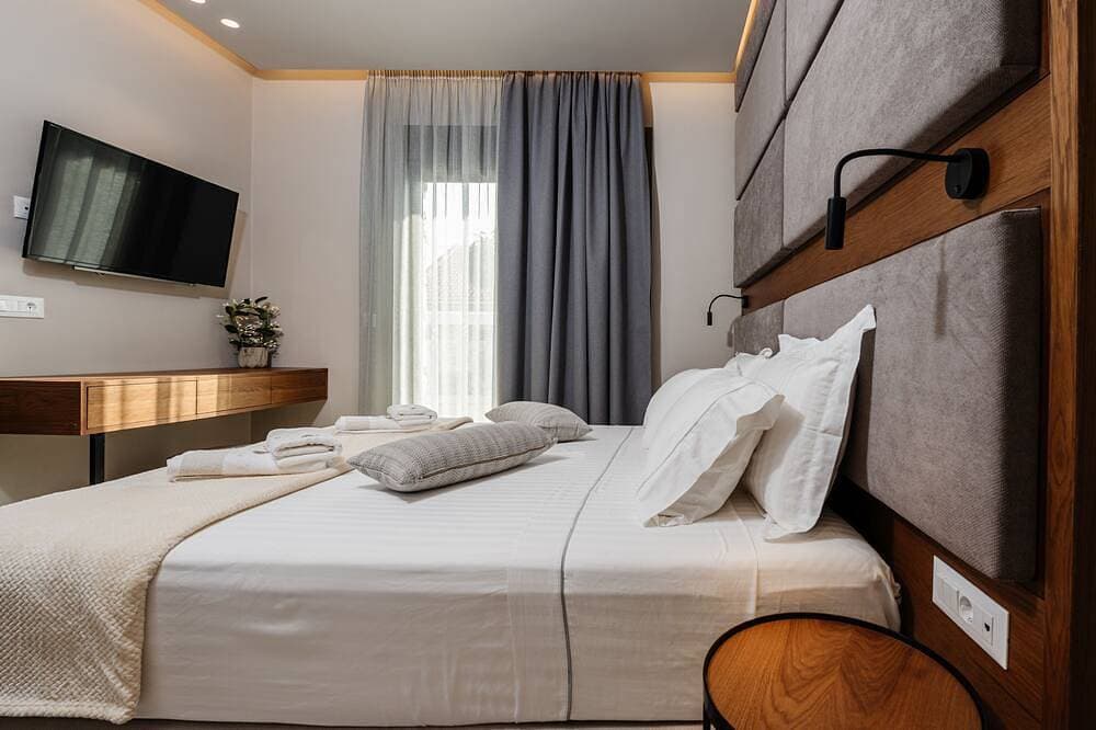 Foto 4 von 30: Horizon Apartments -  Deluxe Triple Room with Sea View