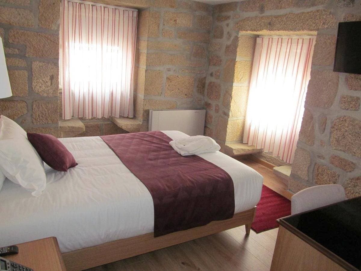 Foto 2 von 9: Triple Room with Balcony