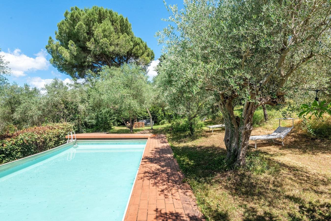 Foto 2 von 26: Ferienwohnung 'Green Siena' mit Gemeinschaftspool, privater Terrasse und Wi-Fi