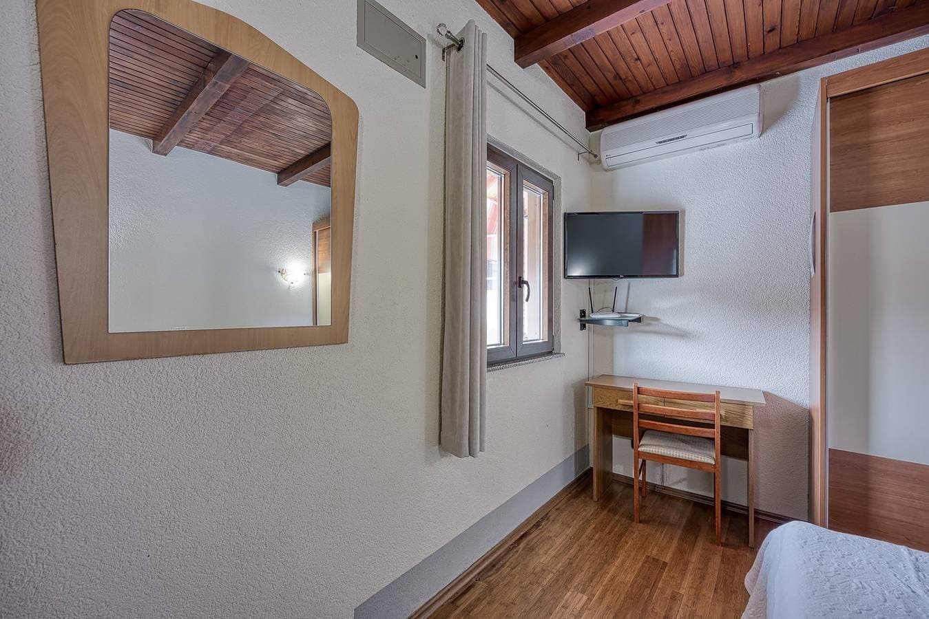 Foto 8 von 12: Ein Schlafzimmer - Haus Folo K1 - Rovinj