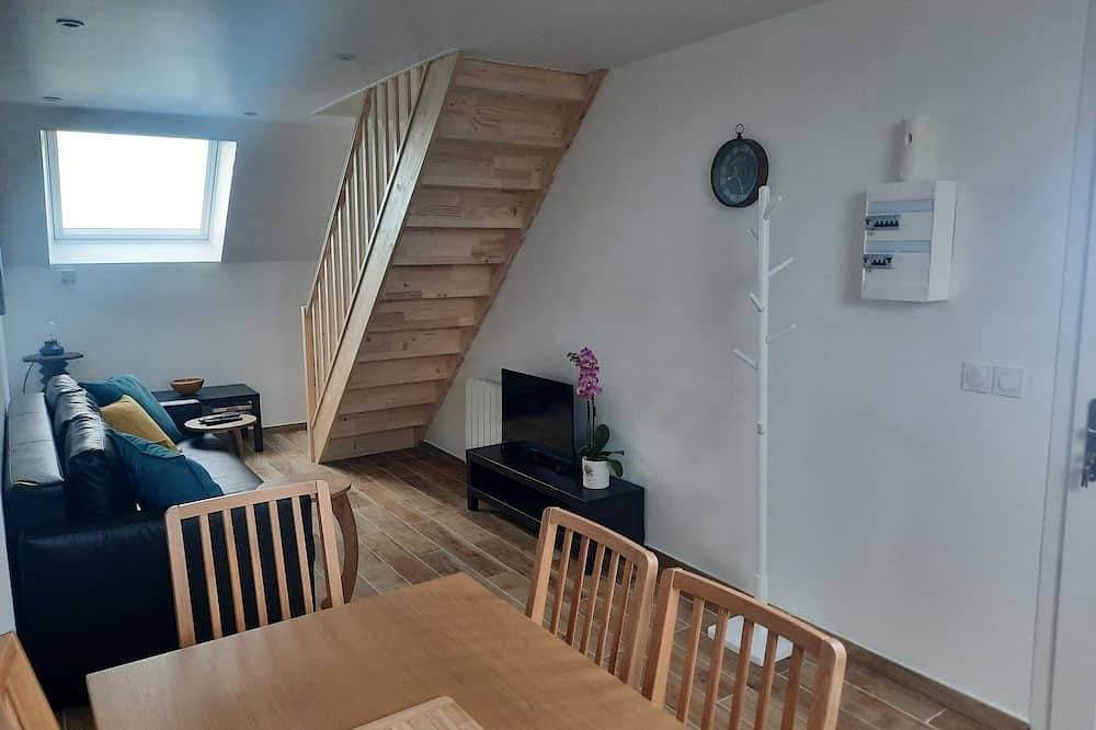 Foto 12 von 30: La Rose des Vents\" duplex apartment with sea view and Arromanches pontoons