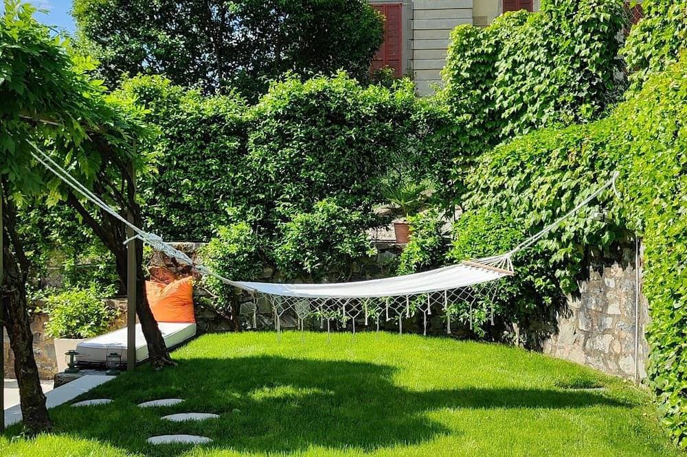 Green Oasis on Lake Iseo - House with Garden and Terrace 1 Minute from the Water 1
