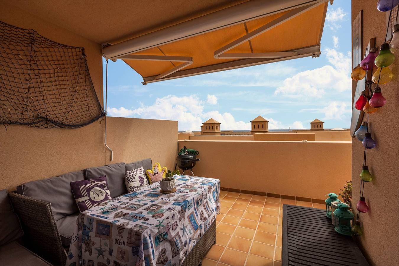 Foto 8 von 28: Apartment 'Apartamento El Porís' mit Meerblick, Gemeinschaftspool, Garten und WLAN