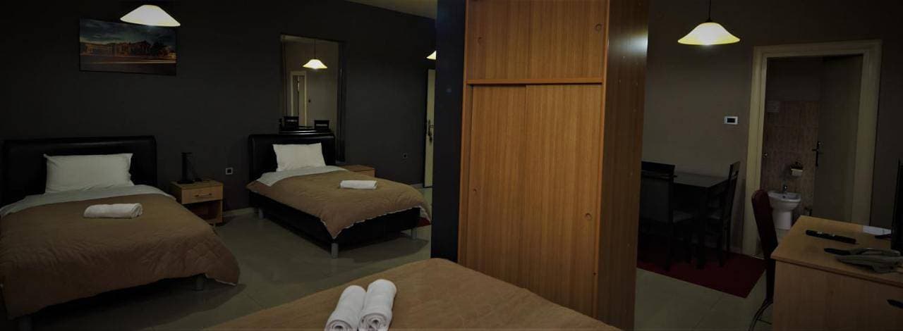 Foto 7 von 16: Quadruple Room