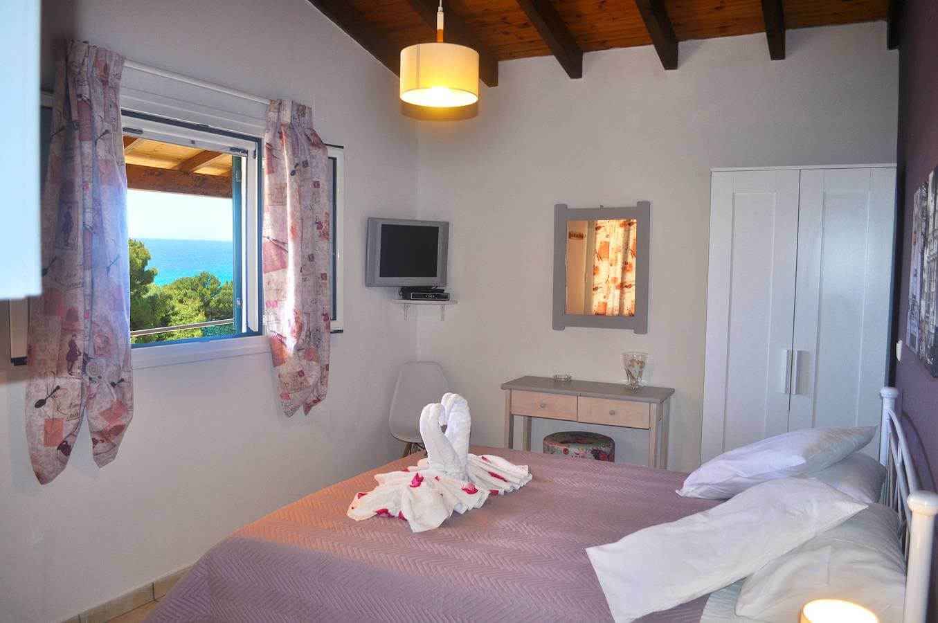 Foto 8 von 18: Villa Takis am Pelekas Strand - Kleines Haus mit Garten und Meerblick