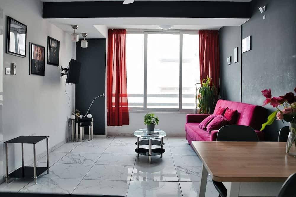 Foto 6 von 19: Cozy Sea View Apt w/ pool access + Netflix