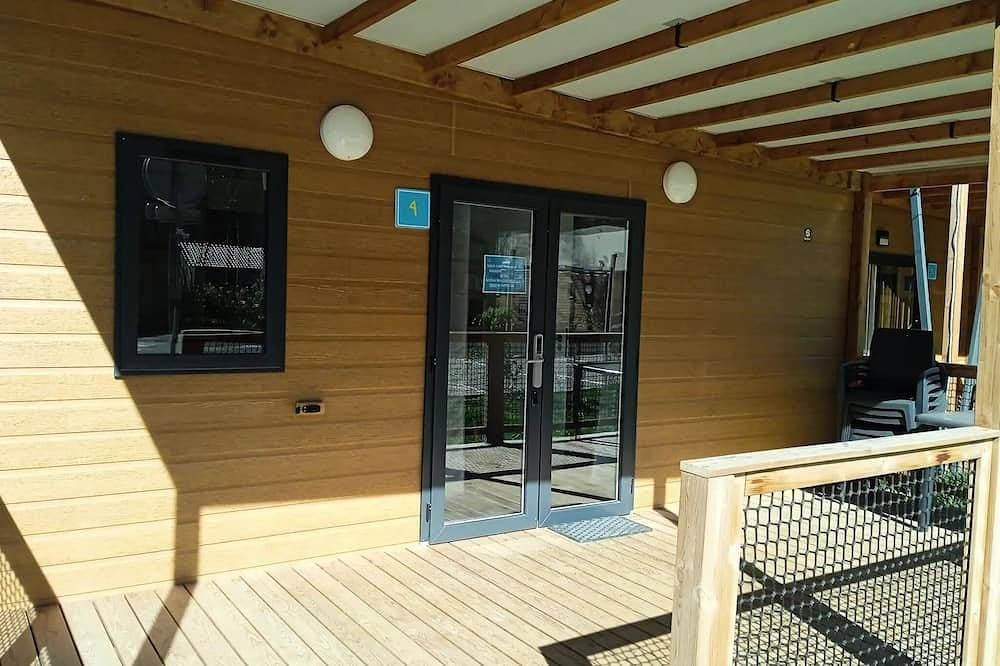 Foto 11 von 30: Mobil-home Confort 23m² - 1 bedroom + Covered terrace + Reversible air conditioning + TV 2 persons